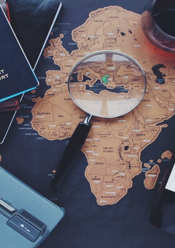 Magnifying glass sitting on a map