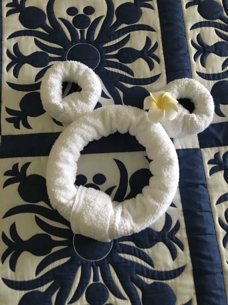 Mickey head made of towels  on our bed at Aulani Resorts