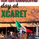 A Vaquero riding a horse and holding a Mexican flag at Xcaret Park