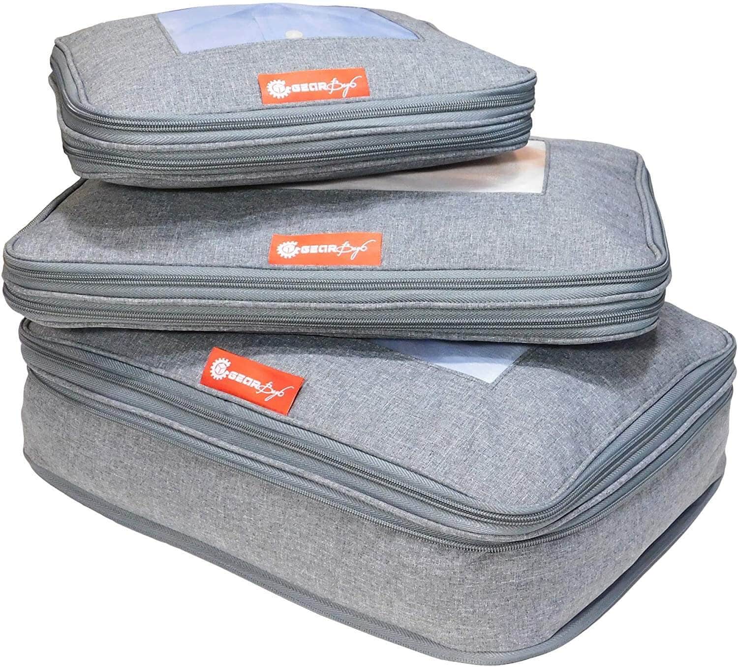 3 grey Compression packing cubes stacked 